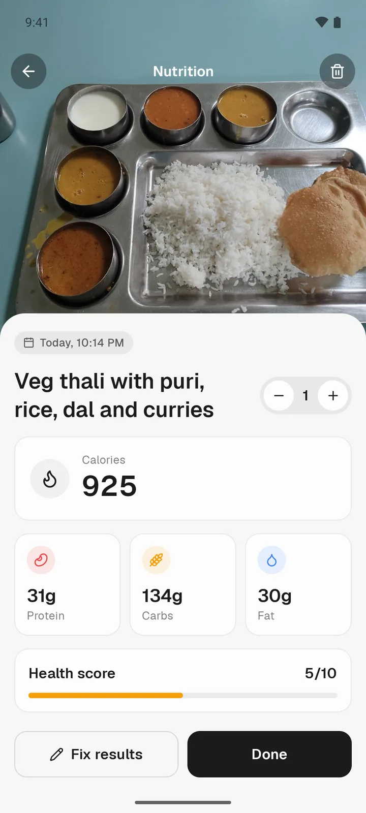 Logged veg thali with photo, servings stepper and macros